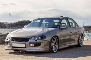 Накладки на пороги STEINMETZ Opel Omega B