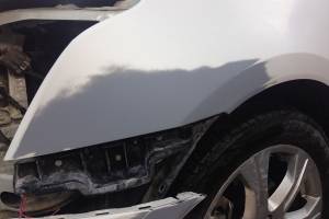 Cadillac SRX 2nd generation 2011 ремонт и локальная покраска переднего левого крыла и переднего бампера 201411 автосервис в Екатеринбурге