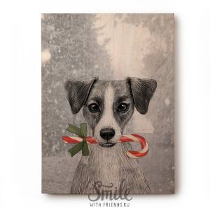 Джек рассел терьер с леденцом на снежном фоне