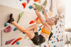 Climber wearing in climbing equipment
